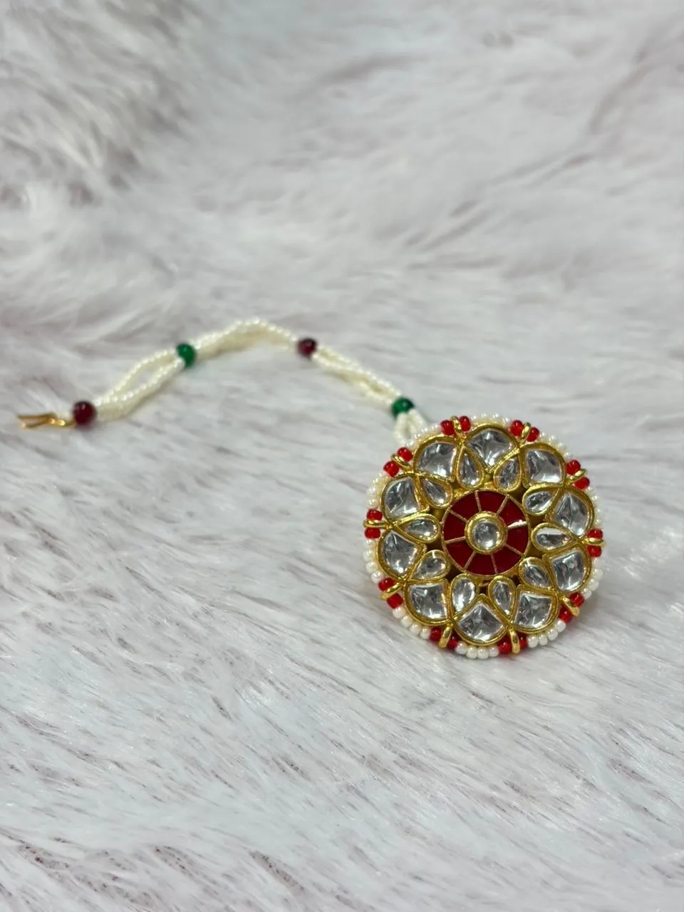 JB47.1 Traditional Floral Rakhdi with Red Kundan - Image 1