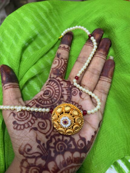 Gold borla with powai